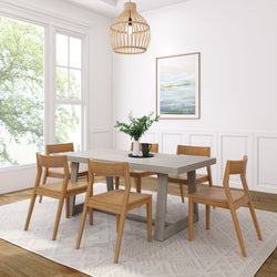 Modern dining room with wooden furniture and neutral decor.