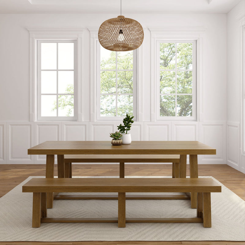 Modern dining room with wooden table and bench, pendant light, and plants near large windows.