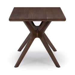 Rustic wooden dining table with unique crossed legs design in dark brown finish.