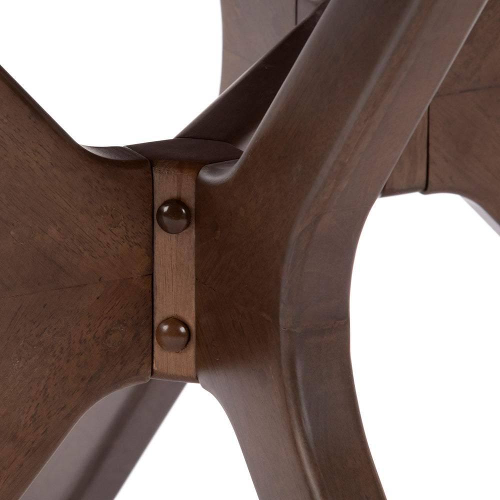 Close-up view of wooden furniture corner joint showcasing craftsmanship and design detailing.