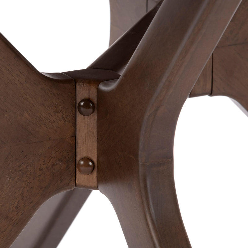 Close-up view of wooden furniture corner joint showcasing craftsmanship and design detailing.