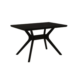 Modern black wooden dining table with unique leg design for contemporary home interiors.