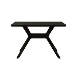Modern black minimalist desk with sleek legs, perfect for home office setups.