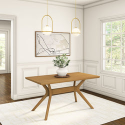 Minimalist dining room with wooden table, white ceramic vase with greenery, abstract framed wall art, gold pendant globe lights, large window and white wainscoting