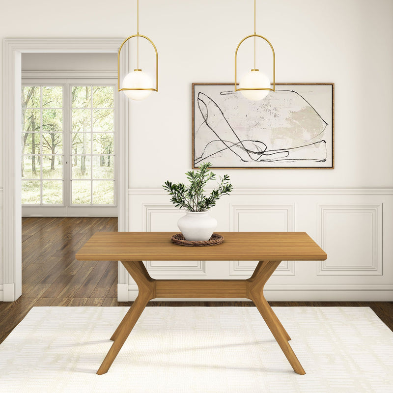 Minimalist dining room with wooden table, white vase, abstract wall art, pendant lights, and large window.