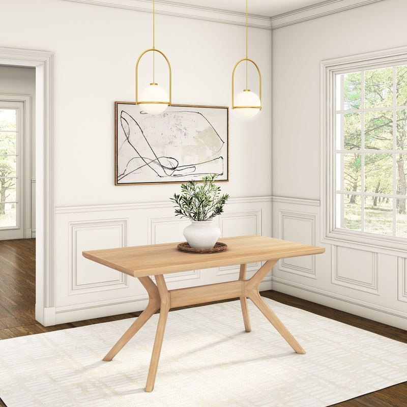 Modern dining room with minimalist table, white walls, and natural light.