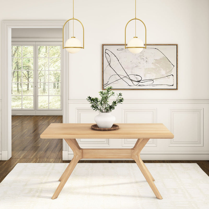 Contemporary dining room with wooden table, modern lighting, and abstract art.