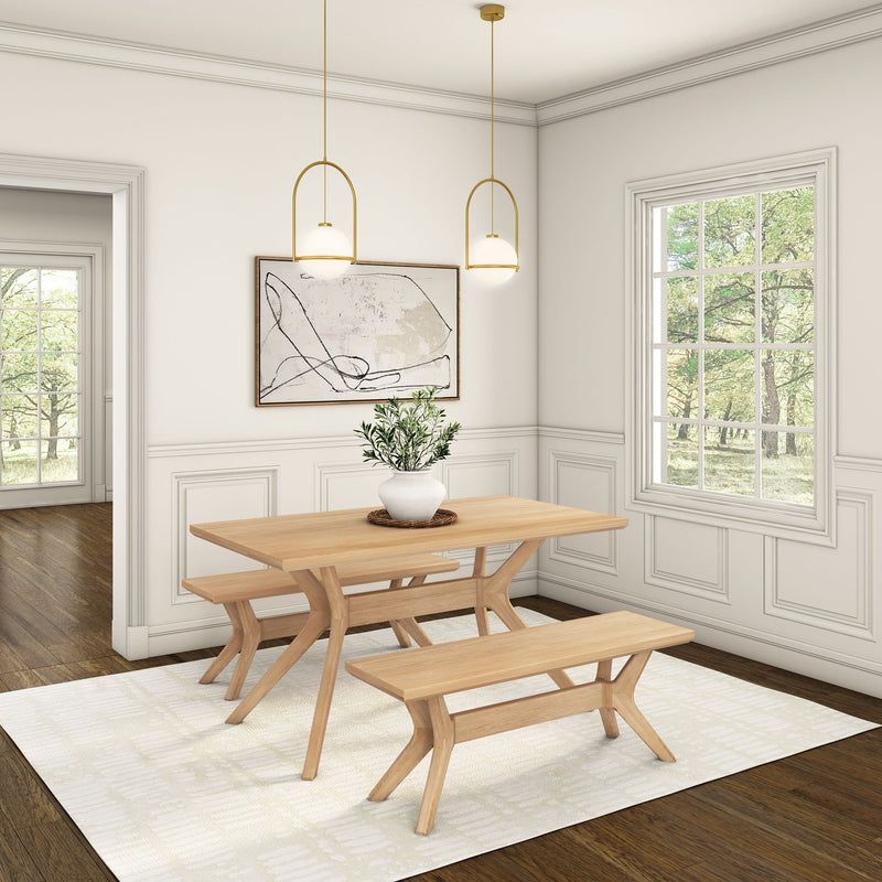 Modern dining room with wooden table, benches, and indoor plant on a light rug, featuring contemporary pendant lights and large window with natural light.