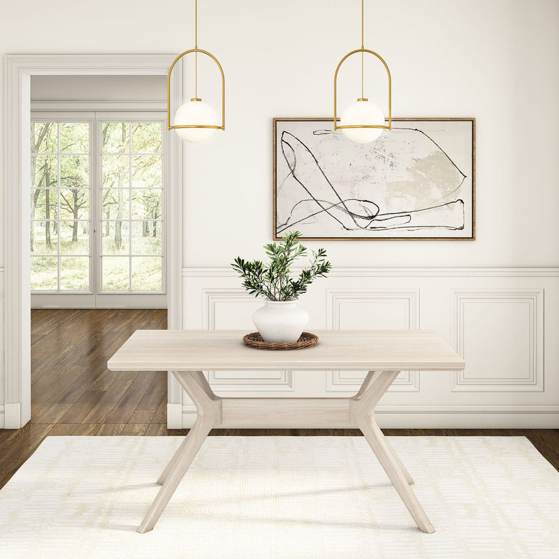 Modern dining room with minimalist wooden table, decorative potted plant, abstract wall art, and pendant lighting.