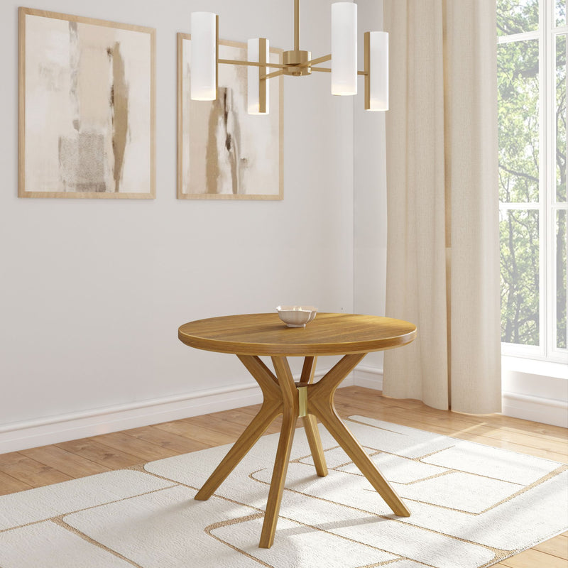 Modern wooden round dining table in minimalist bright room with abstract artwork and elegant light fixture.