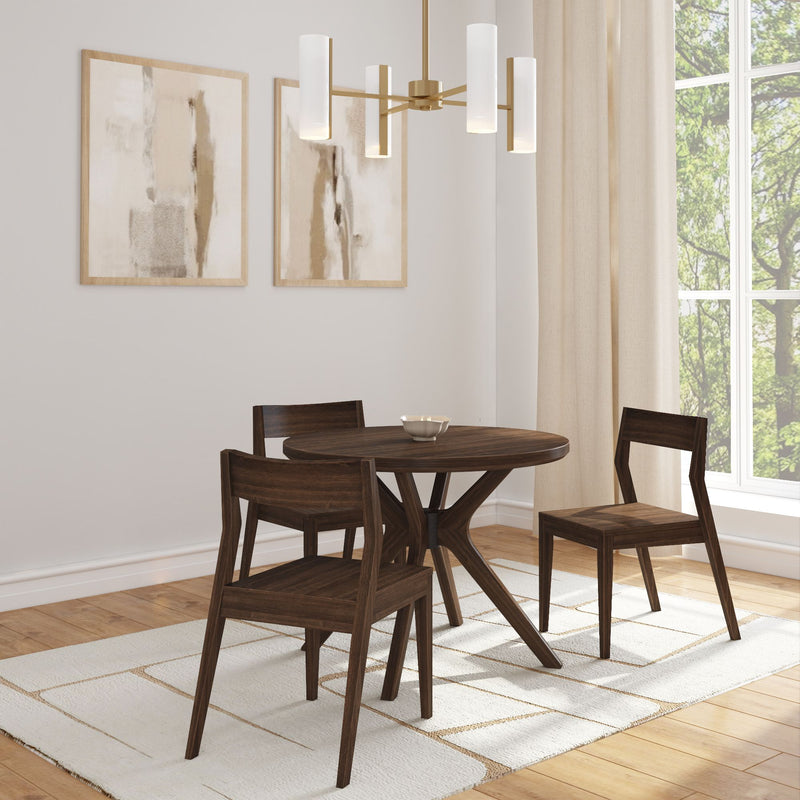 Elegant modern dining room with round wooden table, chairs, contemporary chandelier, and abstract wall art.