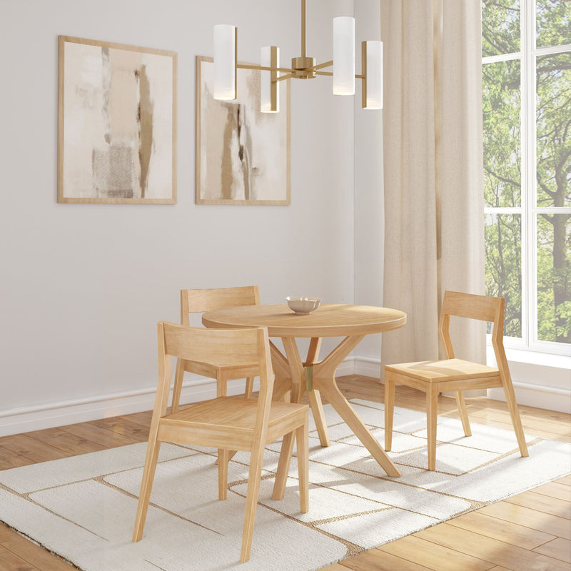 Modern dining room with wooden table and chairs, abstract wall art, and contemporary lighting.