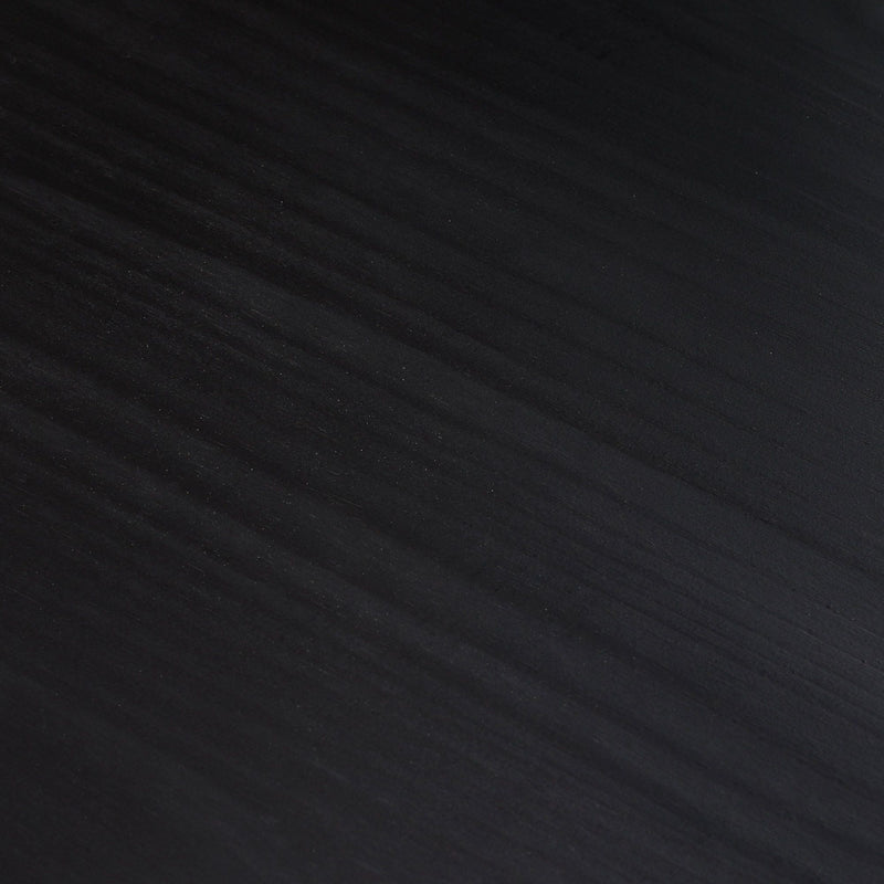 Smooth black wood texture background with subtle grain patterns.
