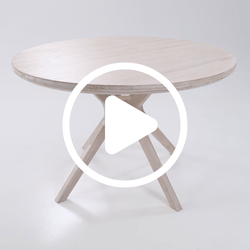 Video thumbnail of round whitewashed oak dining table with angled tripod legs on a white background, modern Scandinavian farmhouse wood pedestal table
