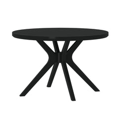 Modern black round dining table with sculptural spider-leg base and matte finish, contemporary dining furniture