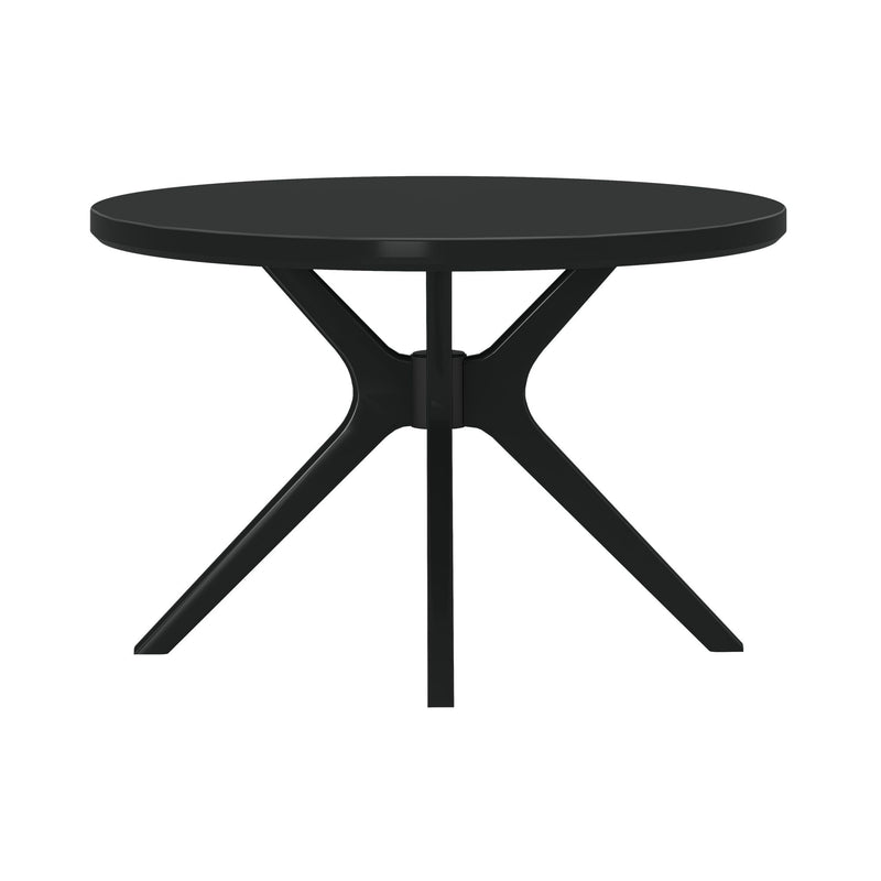 Modern black round dining table with matte top and sculptural pedestal metal base featuring angled legs