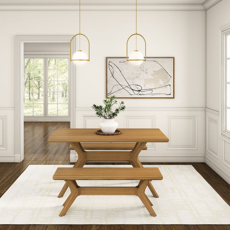 Modern dining room with wooden table, bench seating, and minimalist decor including pendant lights and a plant centerpiece.
