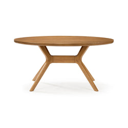 Round wooden dining table with modern design and sturdy legs.