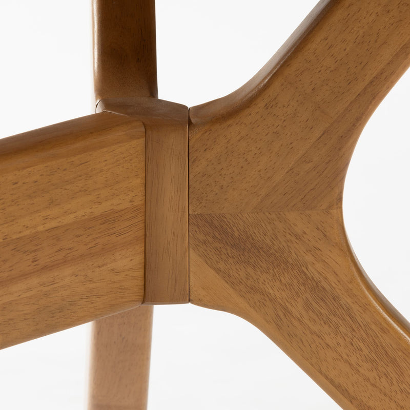 Close-up of a finely crafted wooden joint on a modern wooden chair.