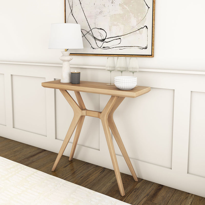 Modern wooden console table with artistic lamp and decorative items in a stylish living room.