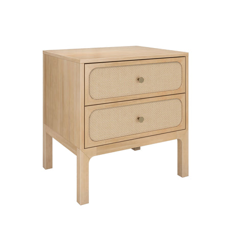 Light oak two-drawer nightstand with woven cane rattan drawer fronts and brass knobs — mid-century modern bedside table