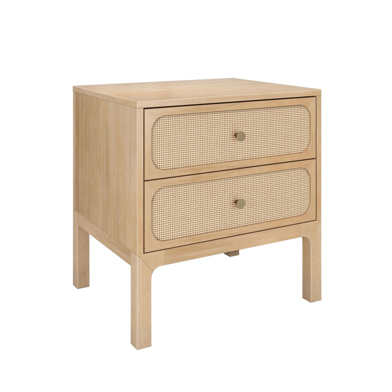 Light wood two-drawer bedside table with woven rattan cane drawer fronts and brass knobs, mid-century modern nightstand