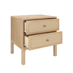 Light natural oak two-drawer bedside table with woven cane (rattan) drawer fronts and round brass knobs, mid-century modern nightstand