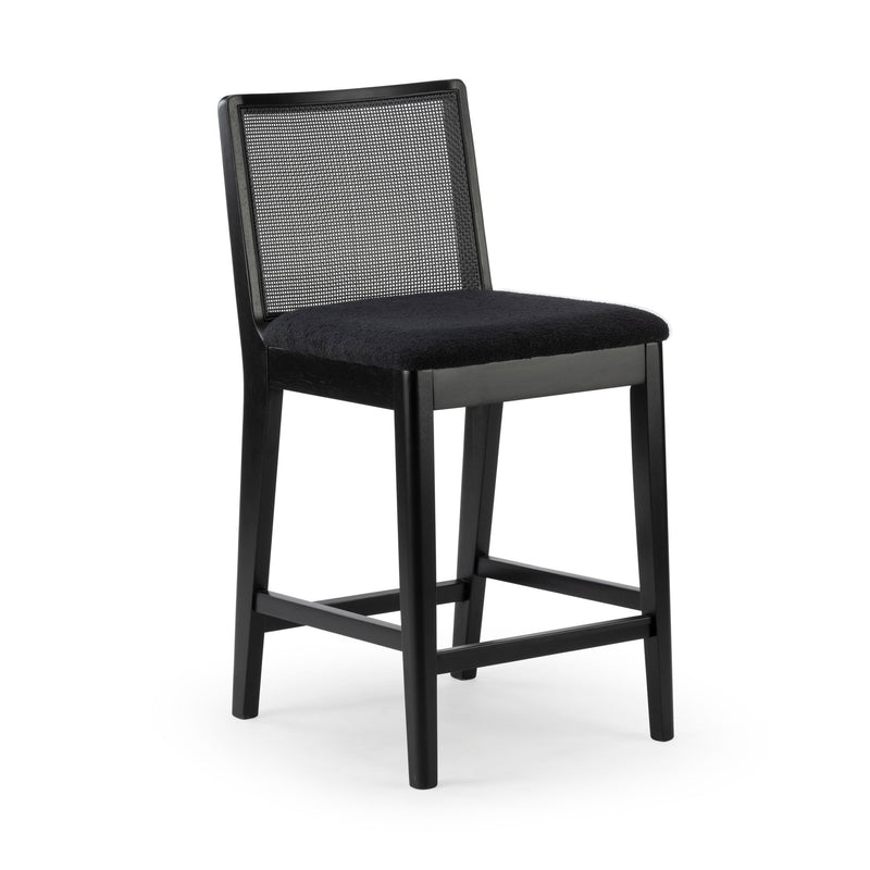 Black wooden counter-height stool with woven cane backrest, padded black upholstered seat and footrest — modern kitchen island bar seating