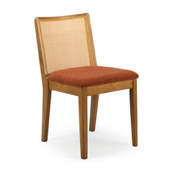 Light wood dining chair with woven cane back and rust-colored upholstered seat, mid-century modern style on white background
