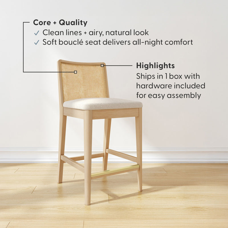 Light oak counter stool with woven cane back and cream bouclé seat, modern mid-century kitchen bar stool