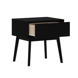 Black mid-century modern nightstand bedside table with single pull-out drawer, tapered wooden legs and matte black finish for small bedroom storage