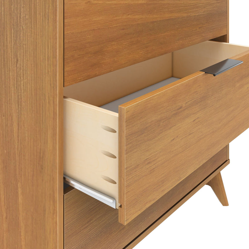 Open wooden dresser drawer showcasing modern design and spacious storage.