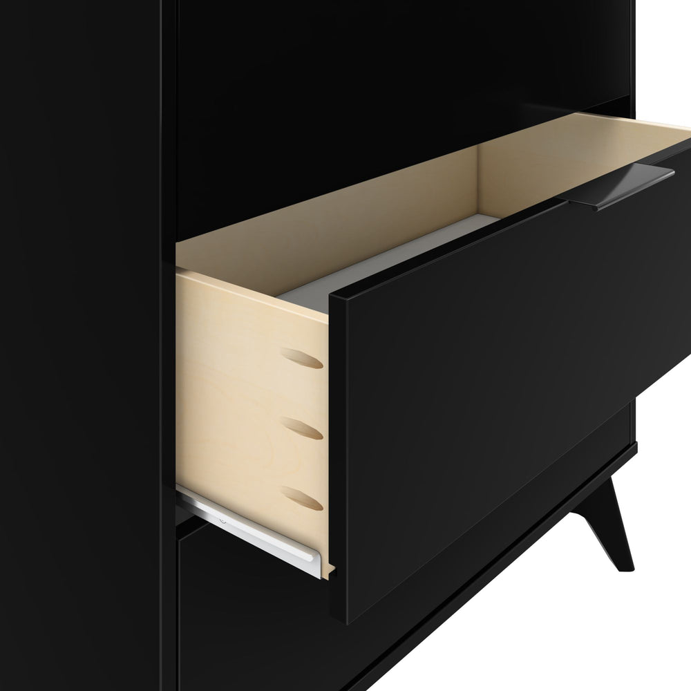 Black wooden dresser with open drawer showcasing minimalist design and craftsmanship.