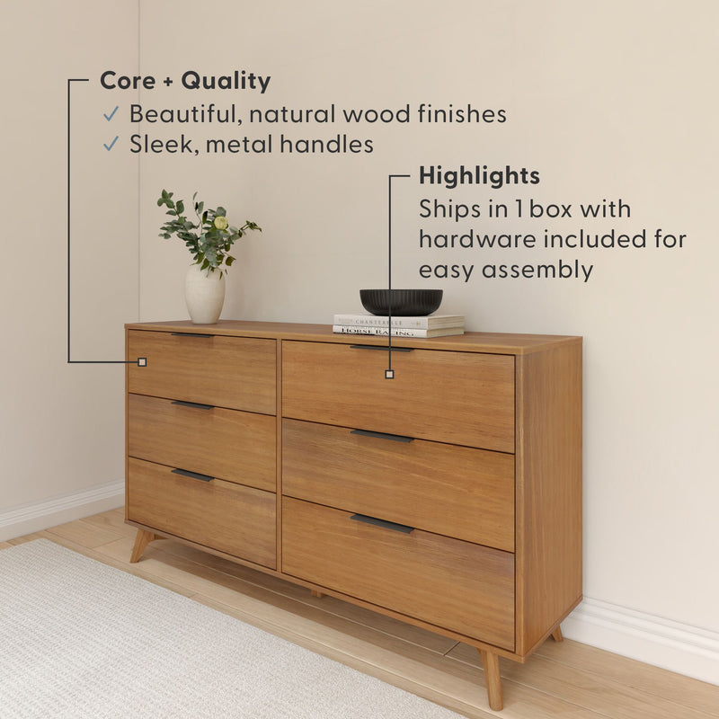 Mid-century modern six-drawer wooden dresser with natural wood finish and sleek black metal handles in a neutral bedroom setting, styled with vase and decorative bowl, ships in one box with hardware for easy assembly