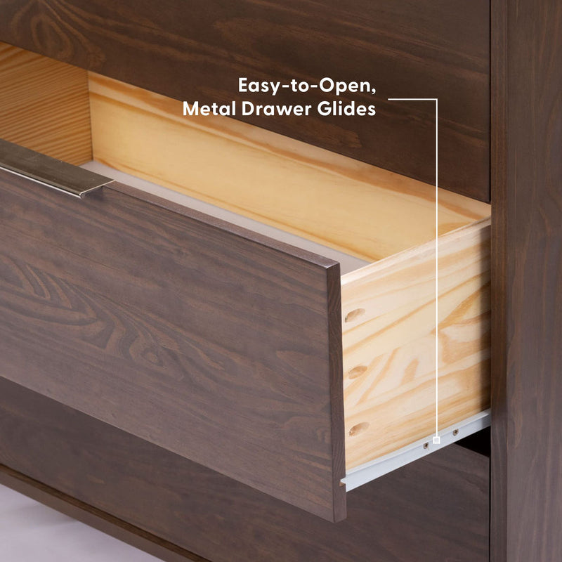 Close-up of a dark wood dresser drawer with light pine interior and metal drawer glides, showcasing easy-to-open bedroom furniture storage.