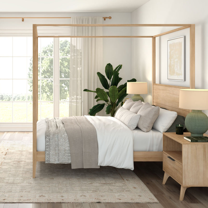 Modern Scandinavian bedroom with natural wood four-poster bed, neutral cozy bedding, large window with sheer curtains, bedside lamps and indoor plant