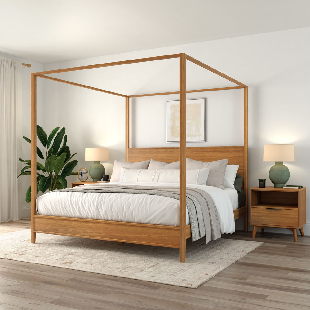 Wooden canopy bed in elegant modern bedroom with green vase and neutral decor.