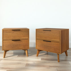 Mid-century modern wooden bedside tables with drawers on hardwood floor.