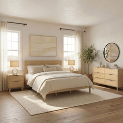 Modern minimalist bedroom bathed in natural light with wooden platform bed, neutral linens, light wood nightstands and dresser, sheer curtains, round wall mirror, and potted olive tree