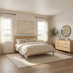 Cozy minimalist neutral bedroom interior with wooden platform bed, beige bedding, textured wall art, sheer curtains, round mirror and potted plant