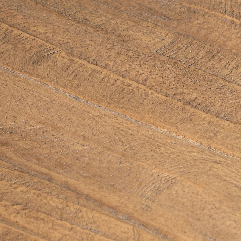 Close-up of rustic oak hardwood floor planks showing natural wood grain texture and warm brown finish