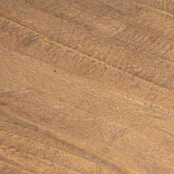 Close-up of rustic oak wood plank flooring texture with warm brown tones, visible natural grain and distressed finish