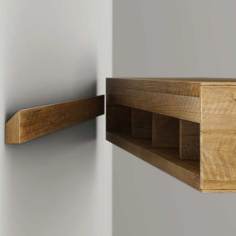 Close-up of wall-mounted floating wooden shelf with French cleat bracket, natural oak grain finish for modern rustic storage and décor