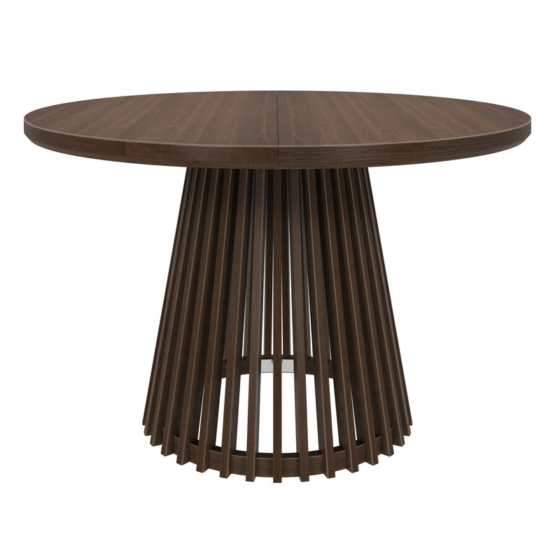 Round wooden dining table with modern slatted base design.