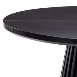 Round black wooden dining table with sleek modern design and sturdy base.