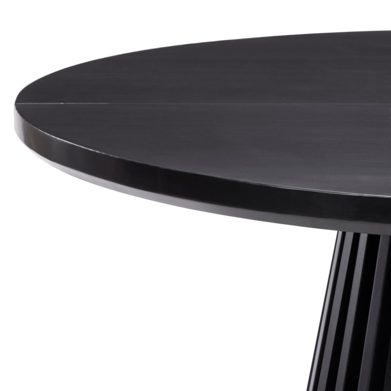 Round black wooden dining table with sleek modern design and sturdy base.