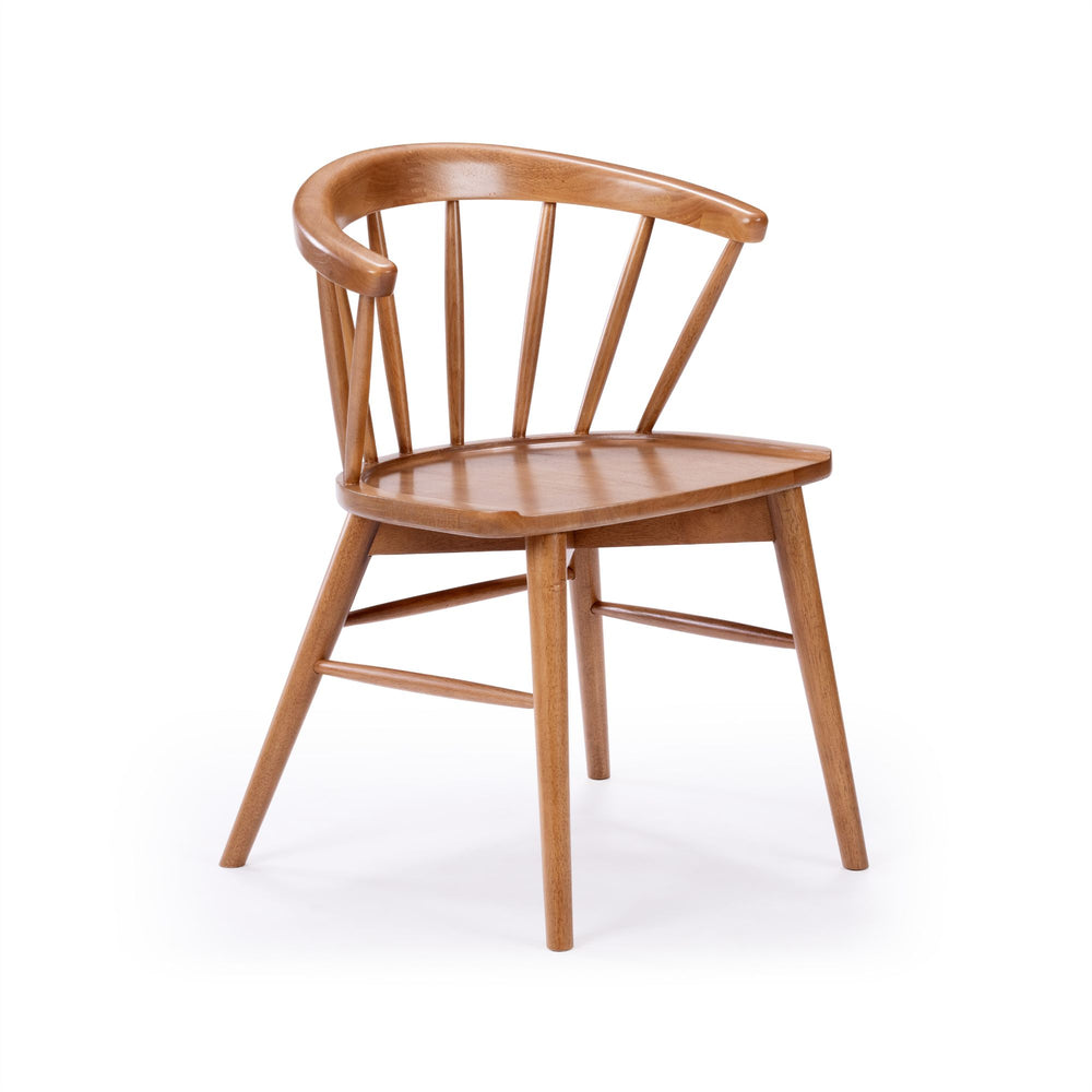 Wooden spindle-back chair with curved backrest and sleek design on white background.