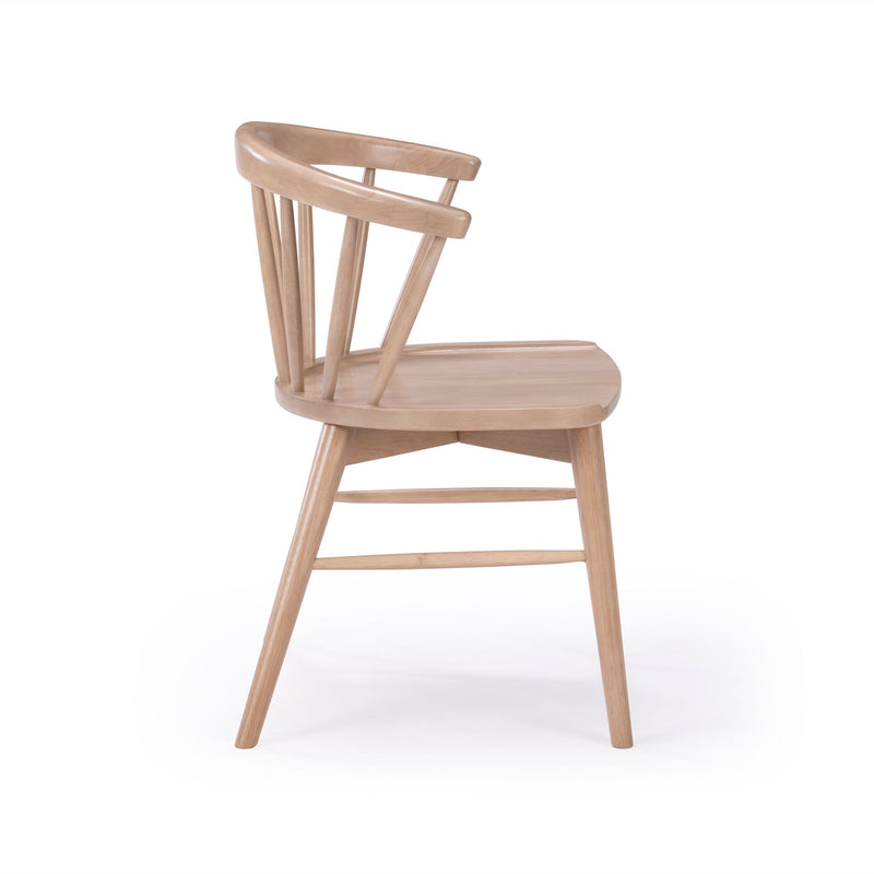 Wooden mid-century modern dining chair with spindle backrest and natural finish.