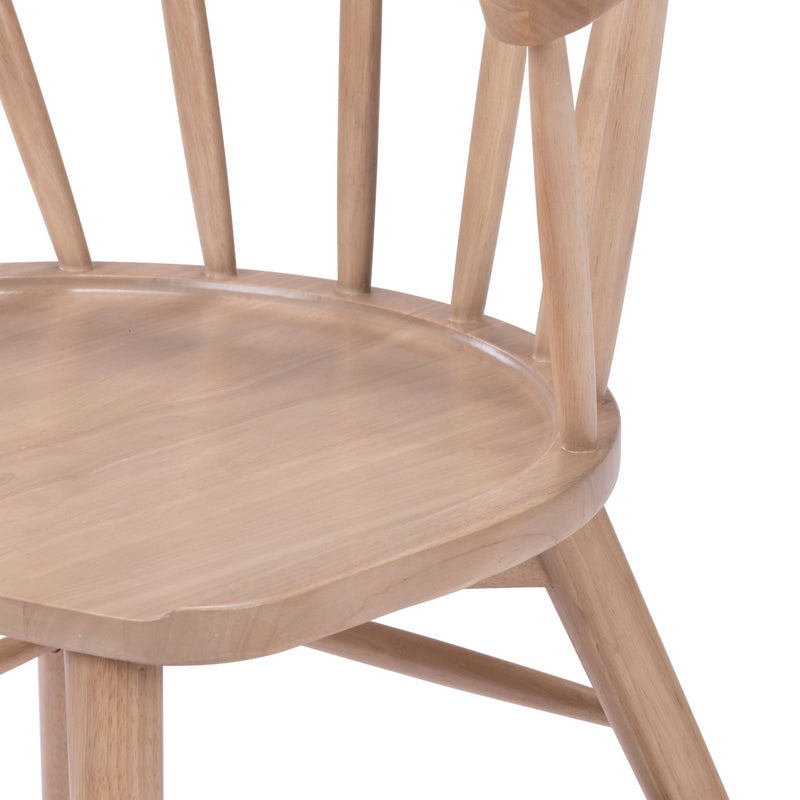 Elegant wooden dining chair with spindle back design for modern dining rooms.