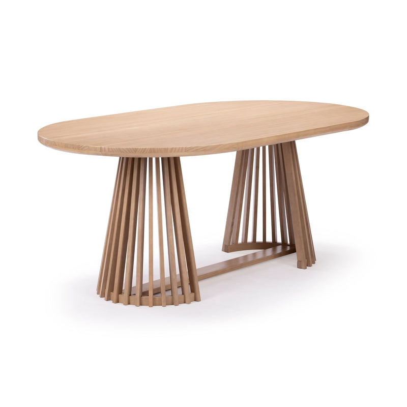 Contemporary oval natural oak dining table with slatted double-pedestal base on white background